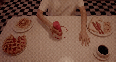 Person Pouring Ketchup On Food GIF