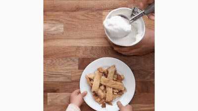 Person Pouring Sugar Into Bowl Next To Plate Of Food GIF