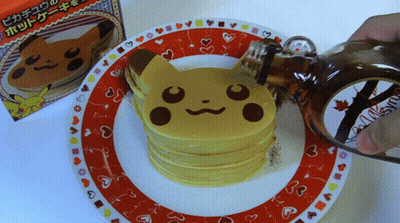 Person Pouring Syrup On Pancake GIF