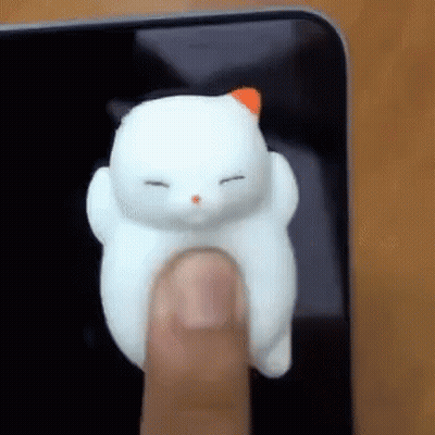 Person Pressing Cell Phone Button With White Cat GIF