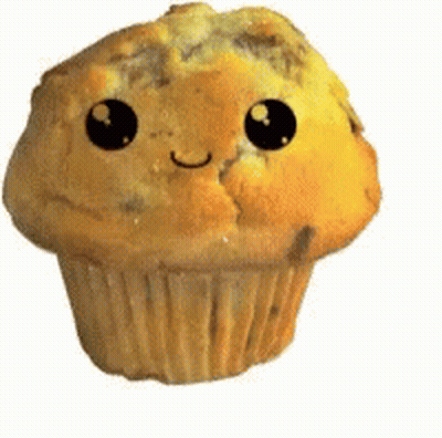 Person Putting Chocolate Chips In Cupcake GIF