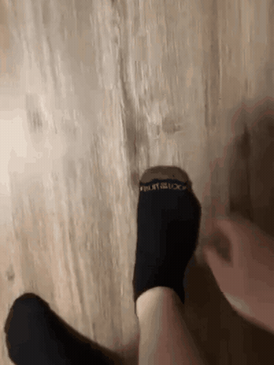 Person Putting On Black Socks Fruit Of The Loom GIF