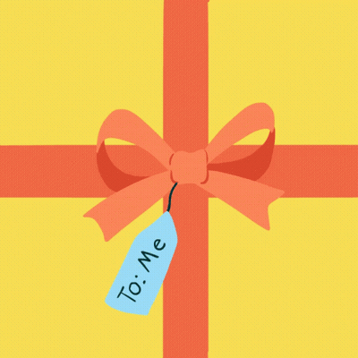 Person Putting Tag on Gift