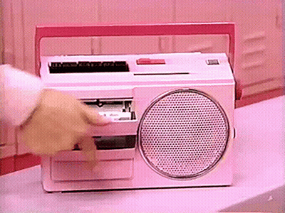 Person Putting Tape In Pink Radio GIF