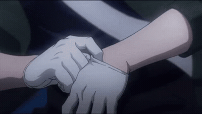 Person Putting White Gloves On Arm GIF