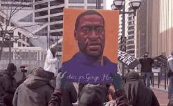 Person Raising George Floyd Picture GIF