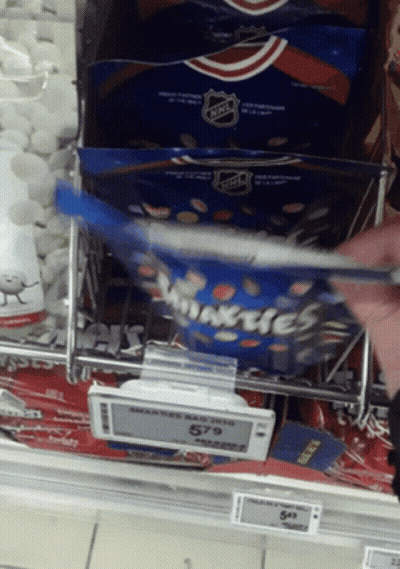 Person Reaching Into Bag Of Minties GIF