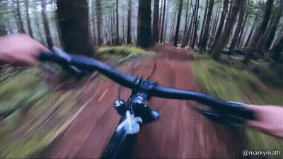 Person Riding Bike On Trail In Woods @Markymath GIF
