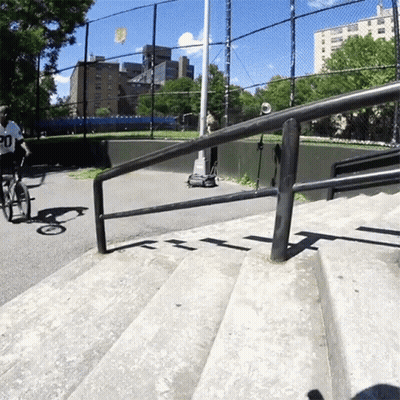 Person Riding Bike With Number 20 GIF