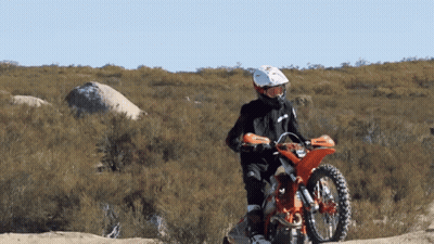 Person Riding Dirt Bike In Desert GIF