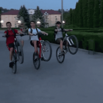 Person Riding Dirt Bike With Passenger GIF