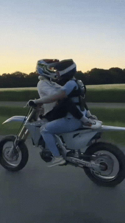 Person Riding Dirt Bike With Passenger GIF