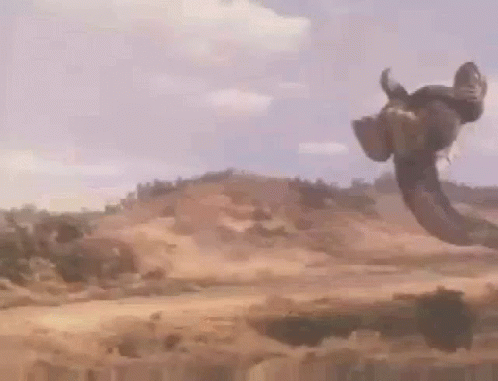 Person Riding Horse In Desert GIF