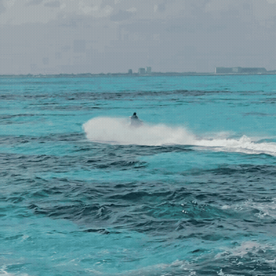 Person Riding Jet Ski GIF