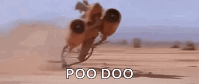 Person Riding Motorcycle in Desert Saying Poo Doo