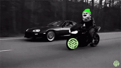 Person Riding Motorcycle Next To Car On Highway GIF