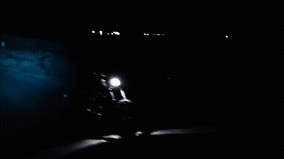 Person Riding Motorcycle On Dark Road GIF