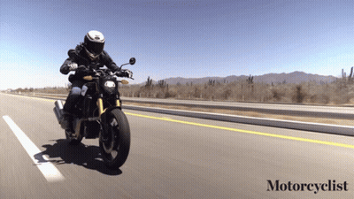 Person Riding Motorcycle On Highway Saying Motorcyclist GIF