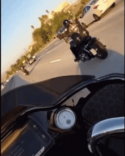Person Riding Motorcycle On Highway Saying No GIF