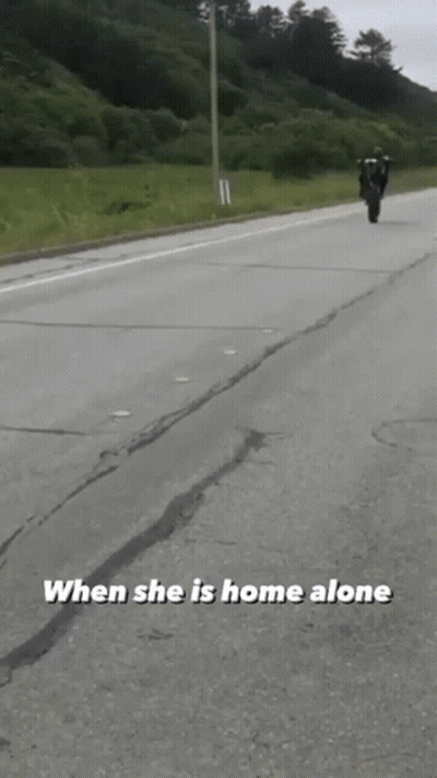 Person Riding Motorcycle When She Is Home Alone GIF