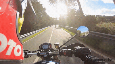 Person Riding Motorcycle With Moto Helmet GIF