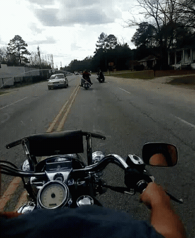 Person Riding Motorcycle With Speedometer Saying MPH GIF