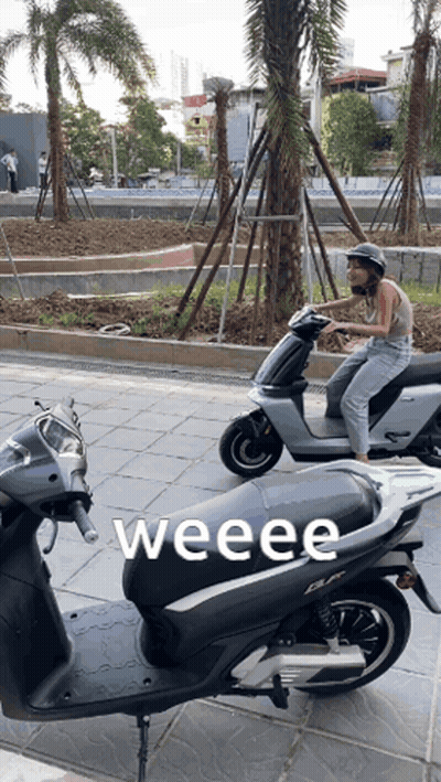 Person Riding Scooter Weeeee GIF