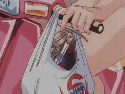 Person Riding Scooter With Plastic Bag Of Groceries GIF
