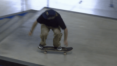 Person Riding Sin City Skateboard GIF