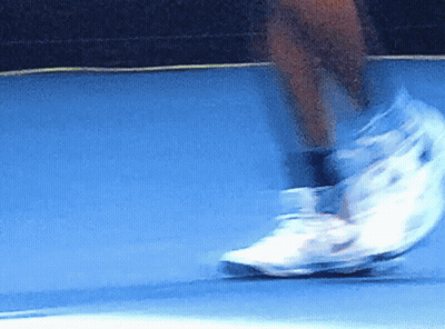 Person Riding Skateboard Down Blue Ramp GIF