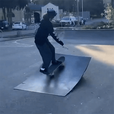 Person Riding Skateboard on Ramp With Hoodie Saying A