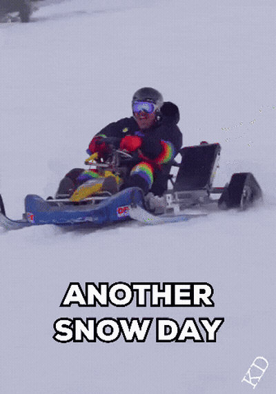 Person Riding Snowmobile With Snow Day GIF