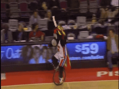 Person Riding Unicycle On Basketball Court Glow Night Out GIF