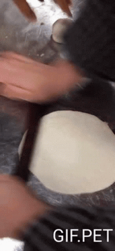 Person Rolling Dough Gif.pet GIF