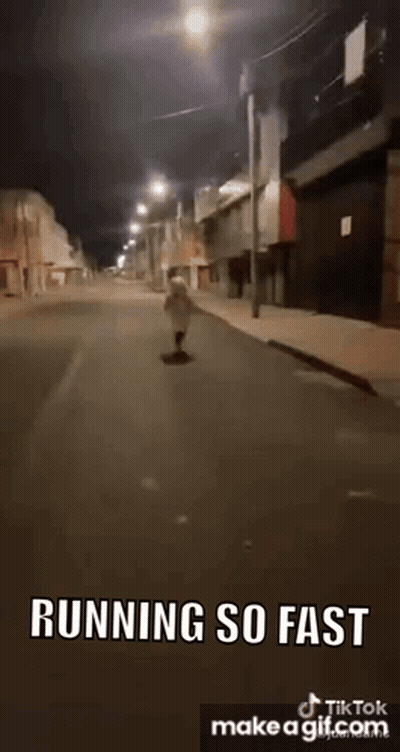 Person Running Down Street At Night Saying Running So Fast GIF