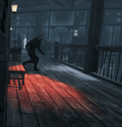 Person Running In Wooden Hallway With Red Light GIF