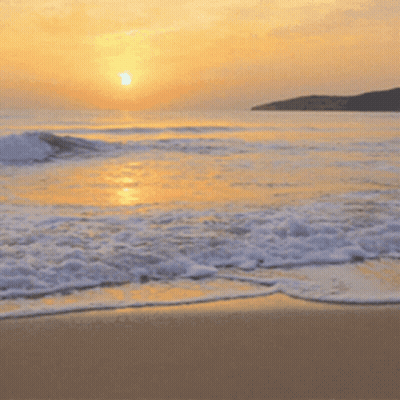 Person Running On Beach With Arms Outstretched GIF
