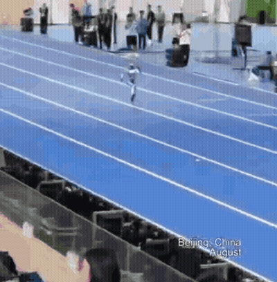 Person Running On Track In Beijing GIF