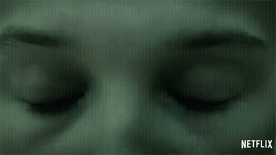 Person's Eyes With Netflix Logo GIF