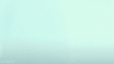 Person's Face Close Up Blue Background GIF