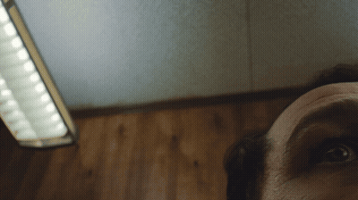 Person's Face Close Up Light Behind GIF