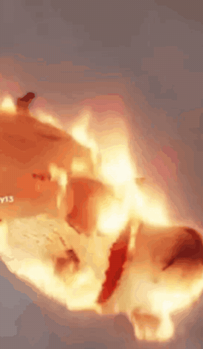 Person's Face On Fire GIF