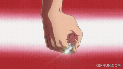 Person's Fist With Light GIF