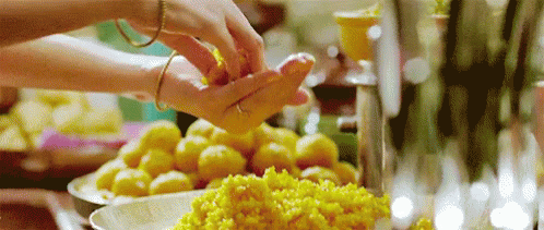 Person's Hand Holding Food GIF