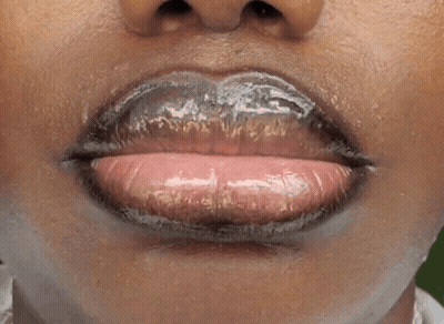 Person's Mouth Close Up With Hole GIF