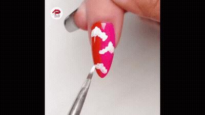 Person's Nails Being Painted GIF