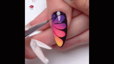 Person's Nails With Colorful Design
