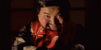 Person's Neck And Ear In Red Dress GIF