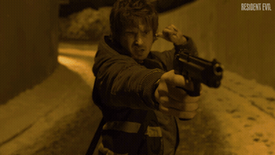 Person Shooting Gun Resident Evil GIF