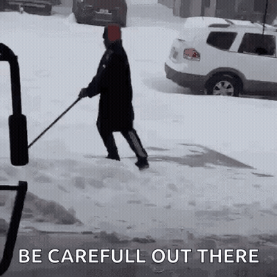 Person Shoveling Snow GIF